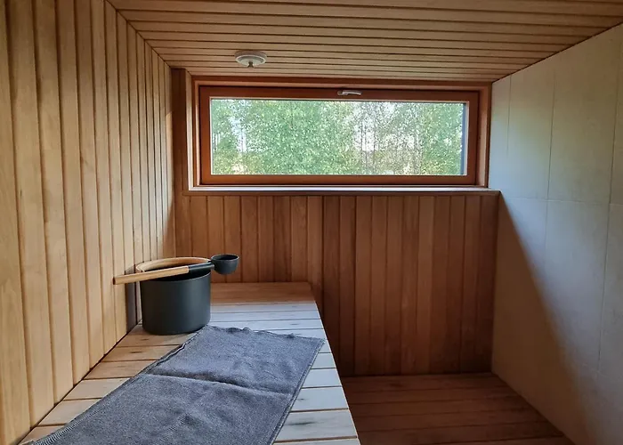 Viihtyisae Vierasmaja Saunalla オウル